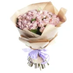 Букет 51 фиолетовая роза в крафте